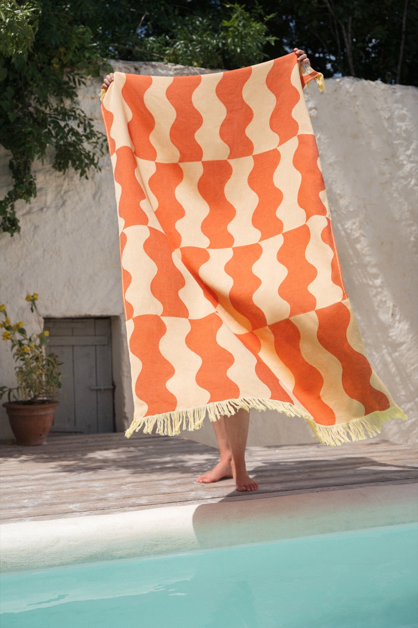 balcony-garden beach-towels orange outdoor summer-interior gift-guide yellow 