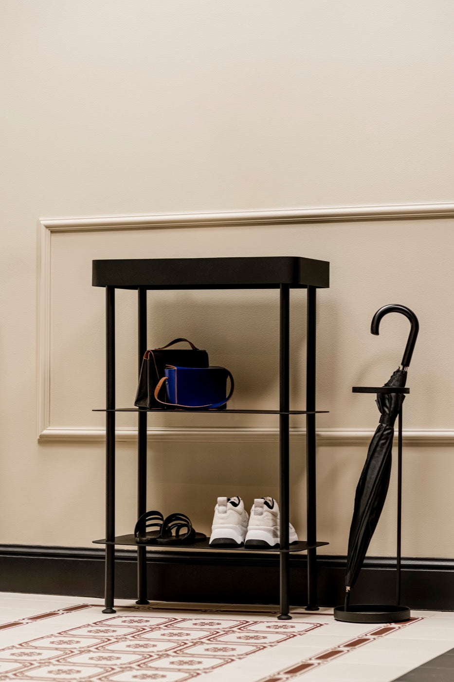 black consoles hallway indoor light-grey shelves shelving-units umbrella-stands 