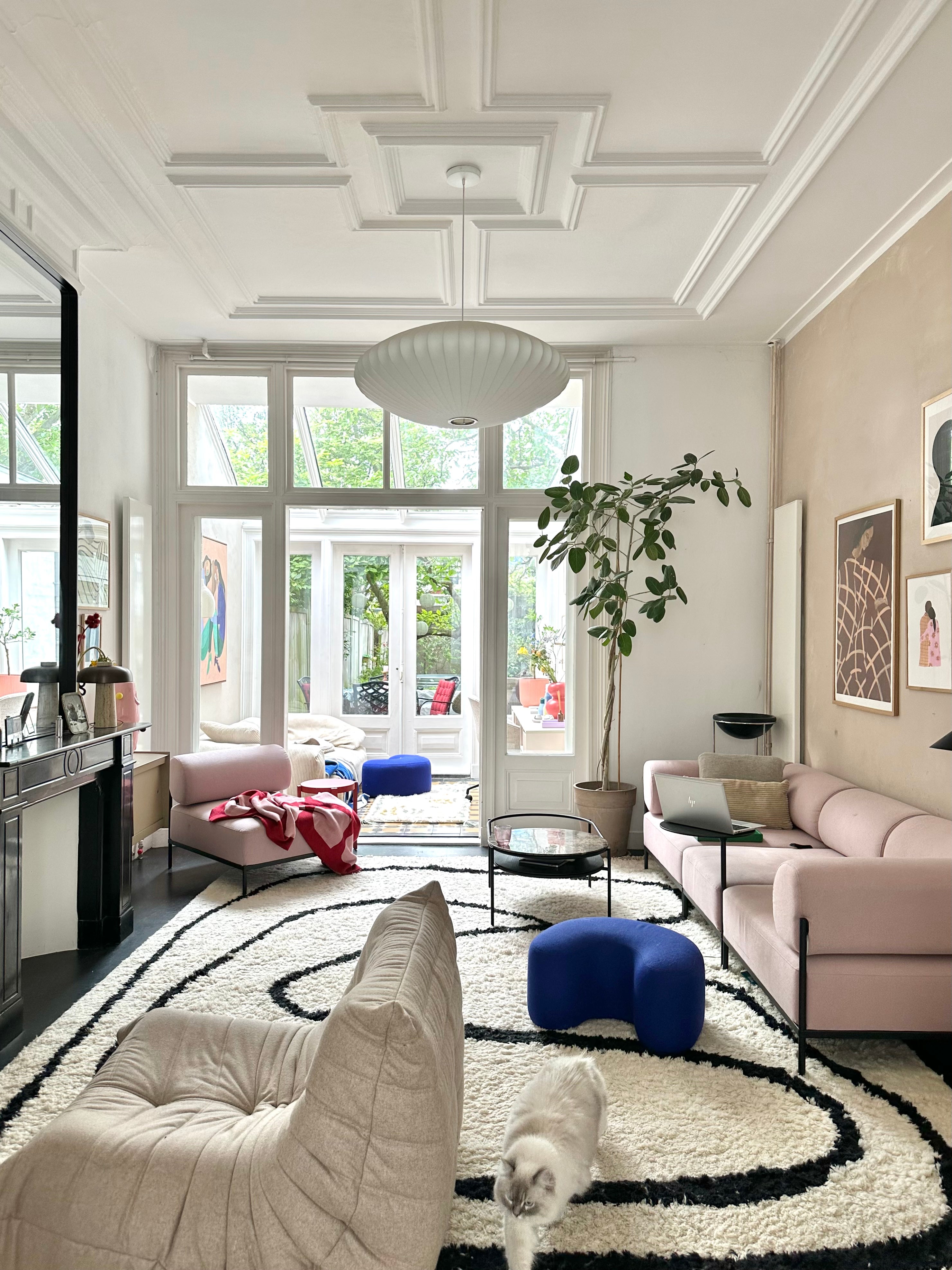 blue indoor living-room poufs pink throws 