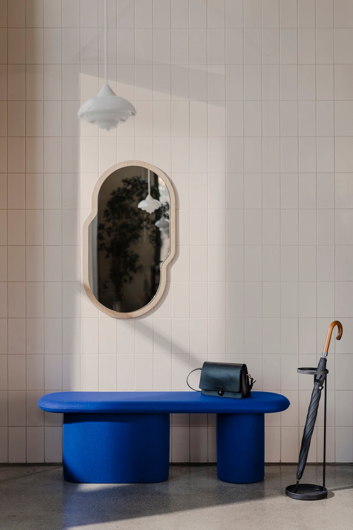 blue hallway indoor mirrors benches black oak poufs seatings umbrella-stands 