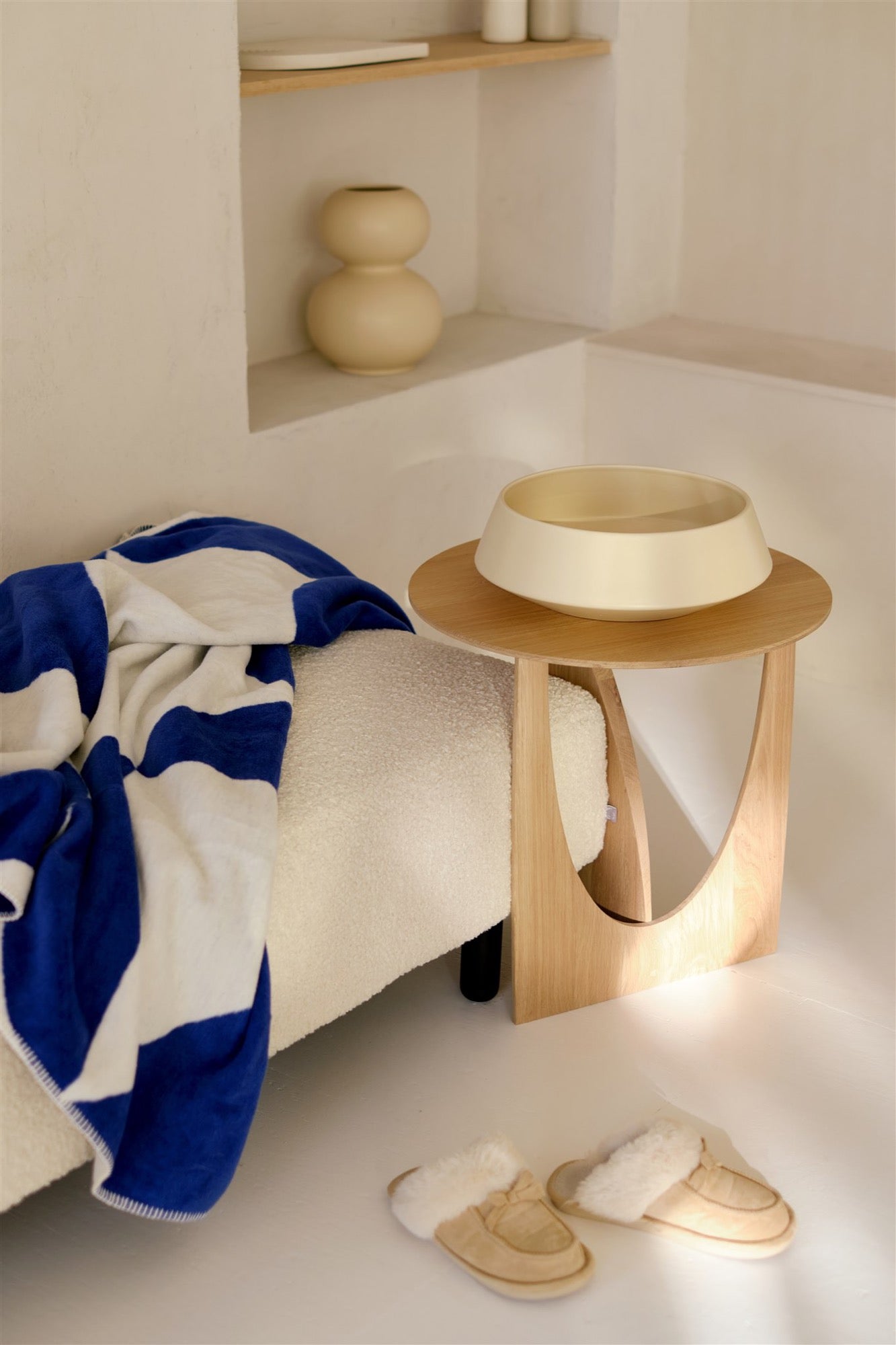 beige indoor living-room summer-interior throws blue bowls gift-guide vases 
