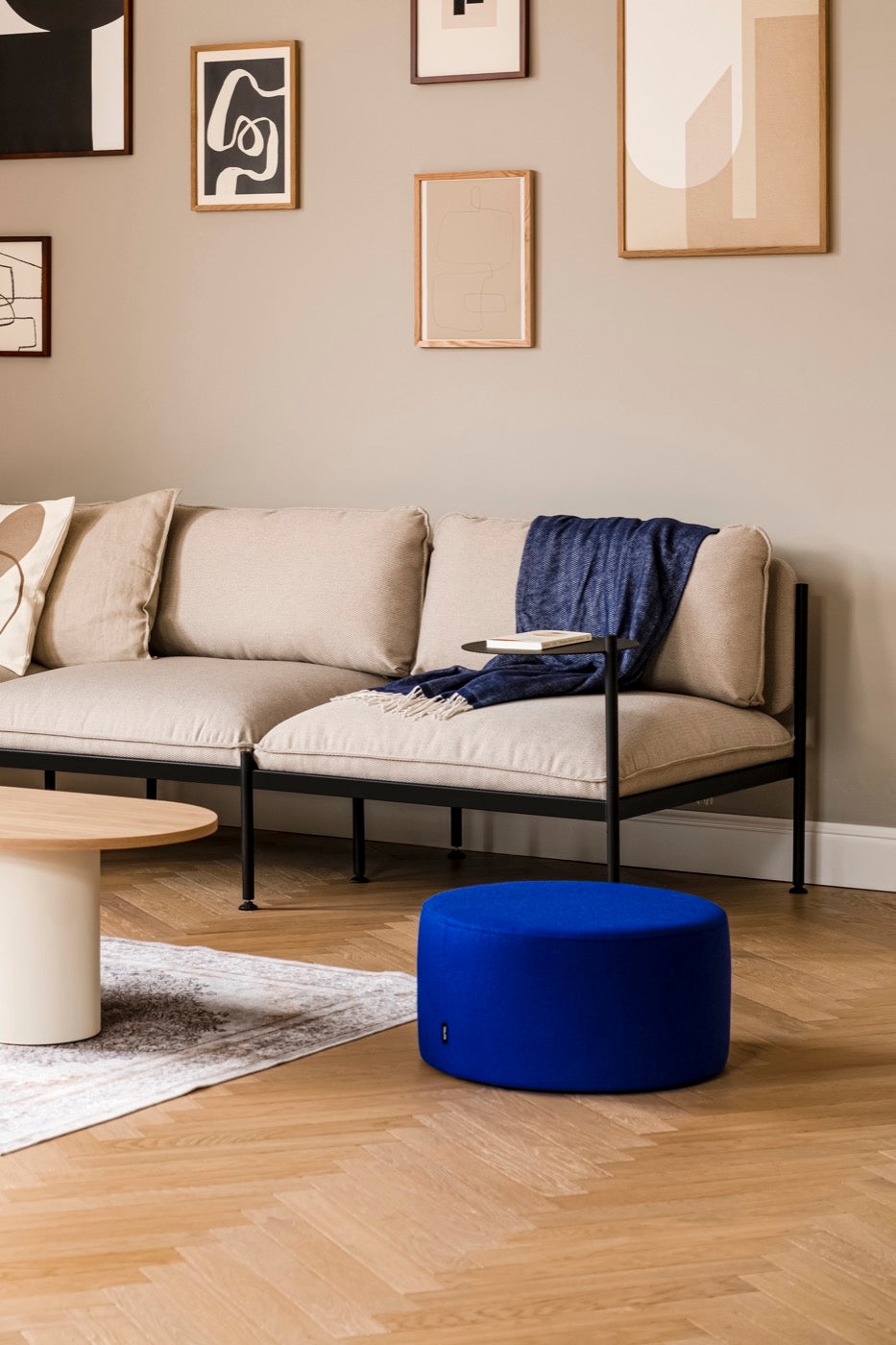 blue indoor living-room sofas beige coffee-tables light-grey oak poufs 