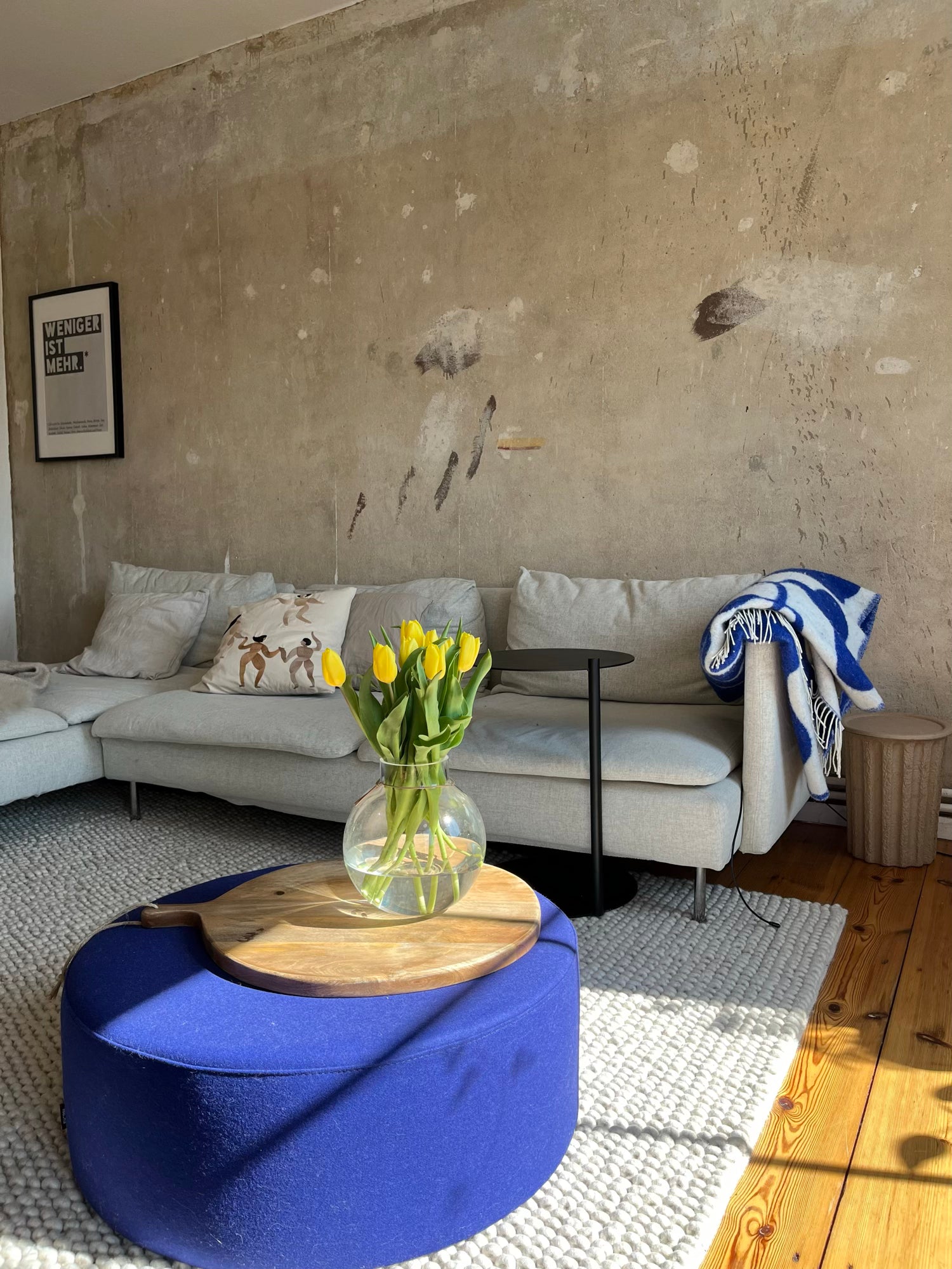 blue indoor living-room side-tables spring-ideas black poufs throws 